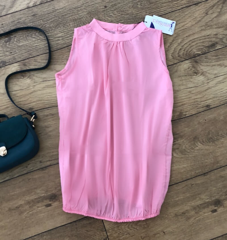 Pink maternity sleeveless blouse fashionably pregnant